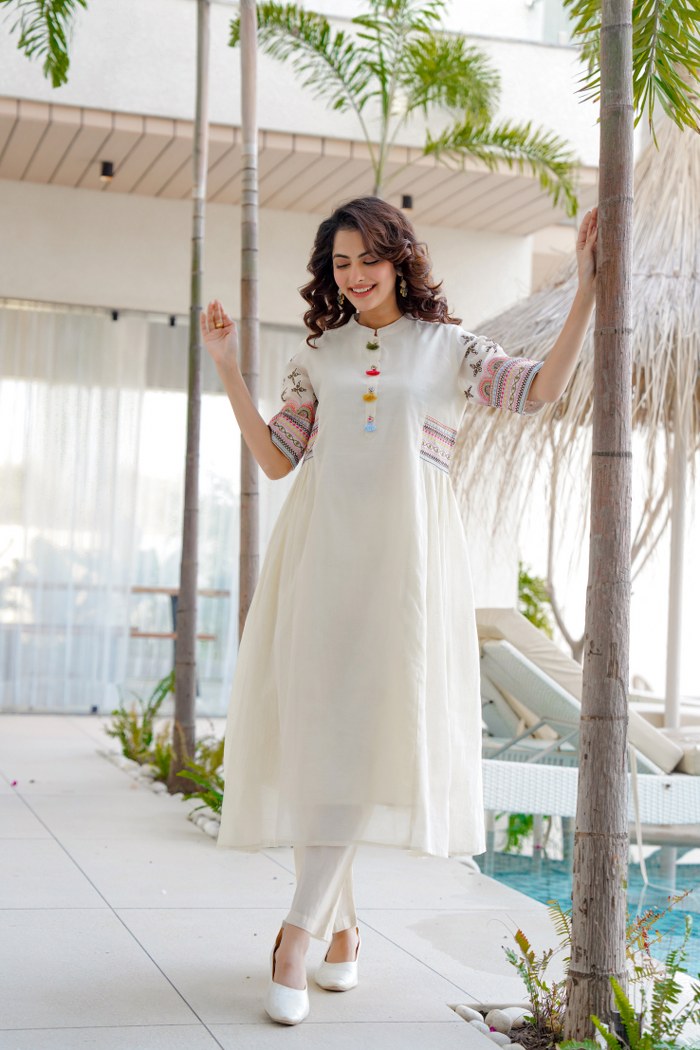 White Cotton A-Line Kurta Set with Embroidered Sleeves & Tassel Detailing