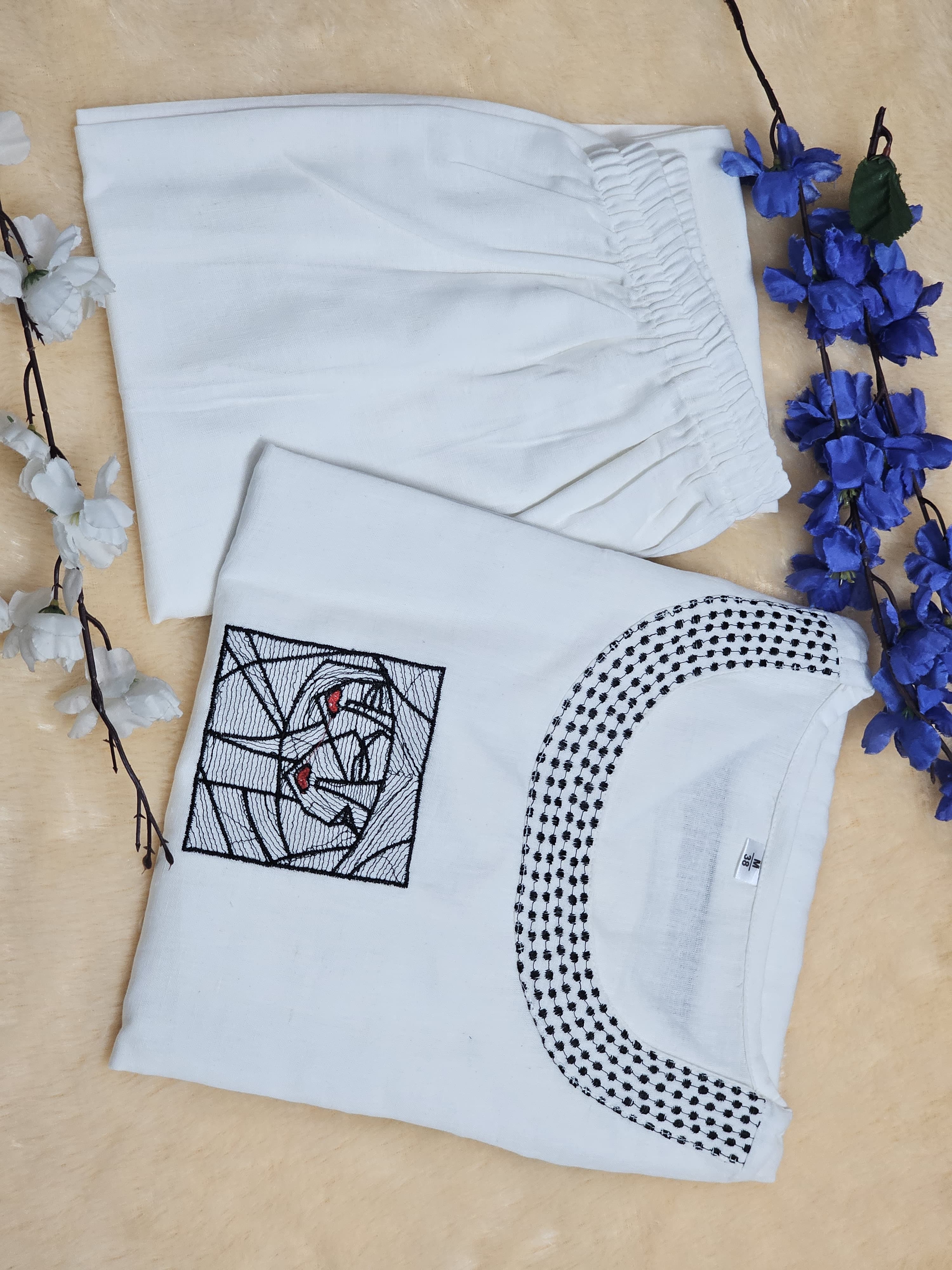 White Cotton Embroidered Co-Ord Set with Abstract Face Art
